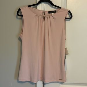 Women’s medium Ivanka Trump Mauve sleeveless blouse.